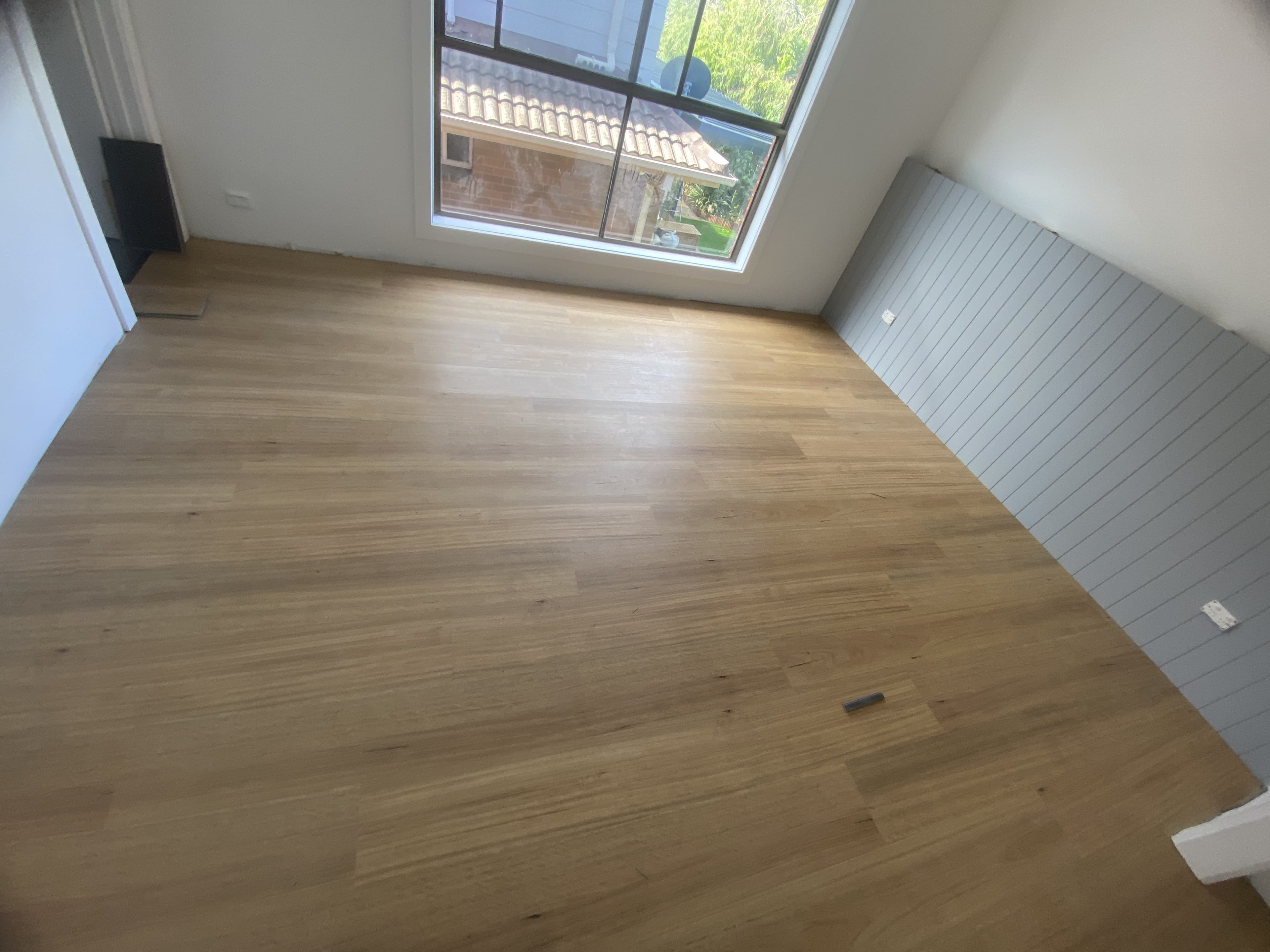 Golden oak straight plank hybrid flooring bedroom Melbourne