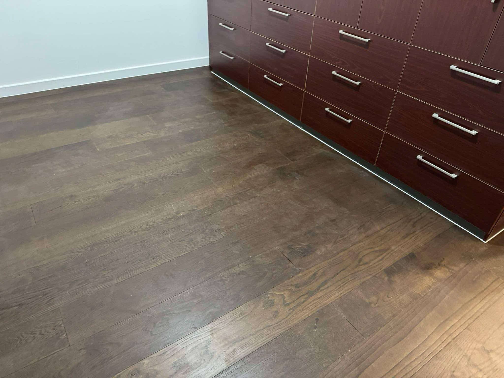 Smoked walnut hybrid flooring bedroom with dark timber joinery Melbourne