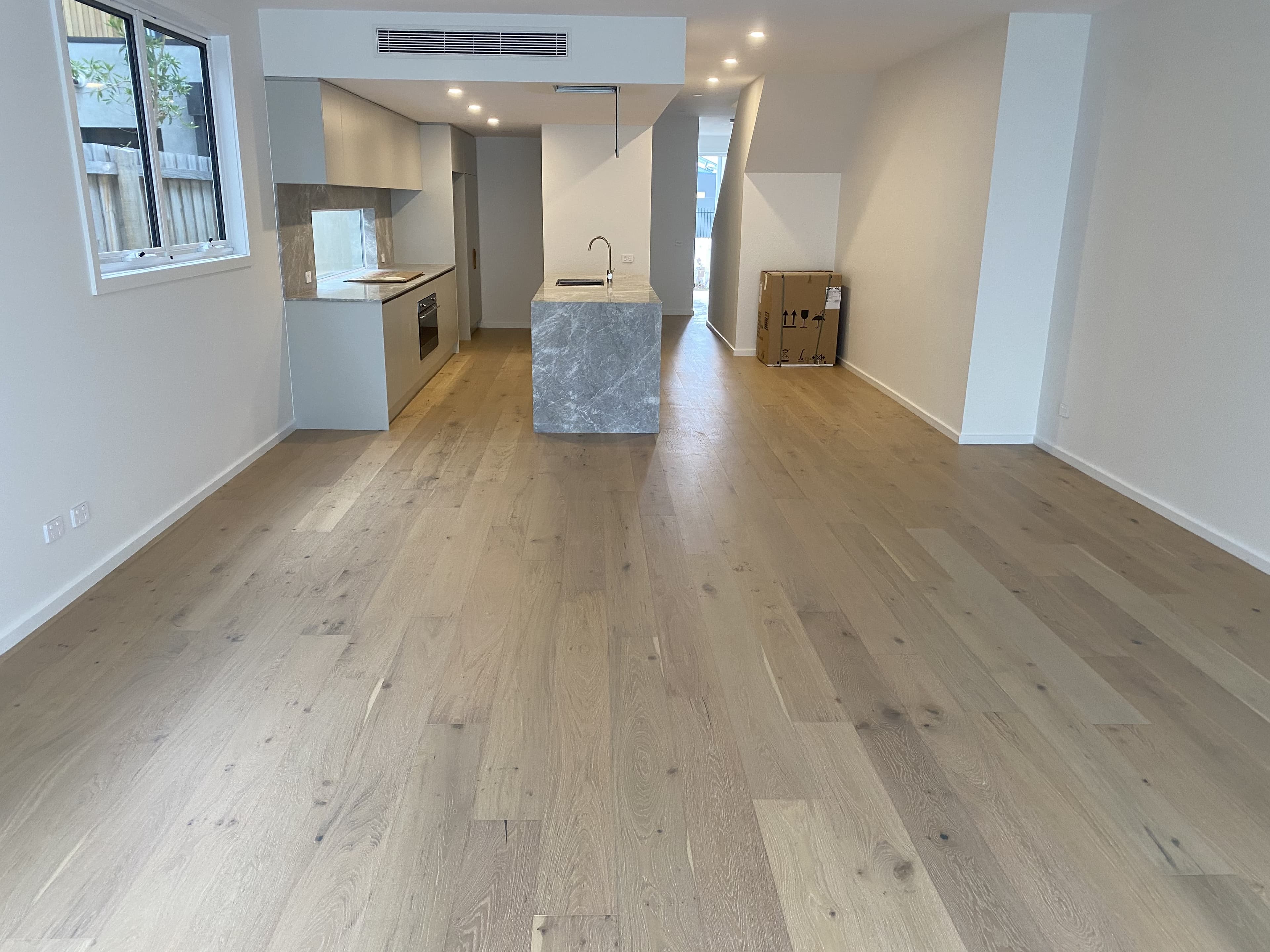 Natural European oak hybrid flooring modern open plan kitchen Melbourne