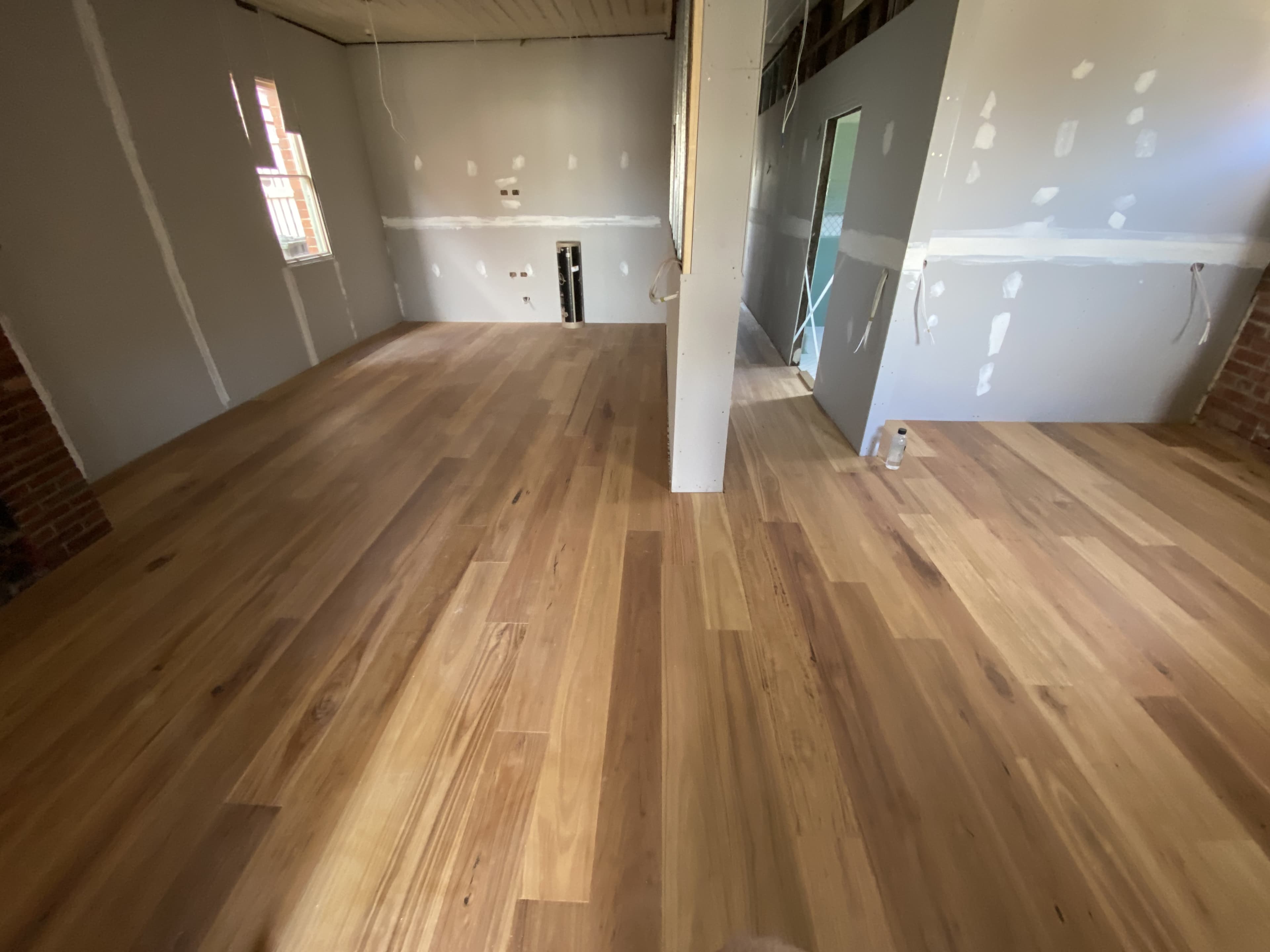 Hybrid herringbone flooring installed in Melbourne apartment