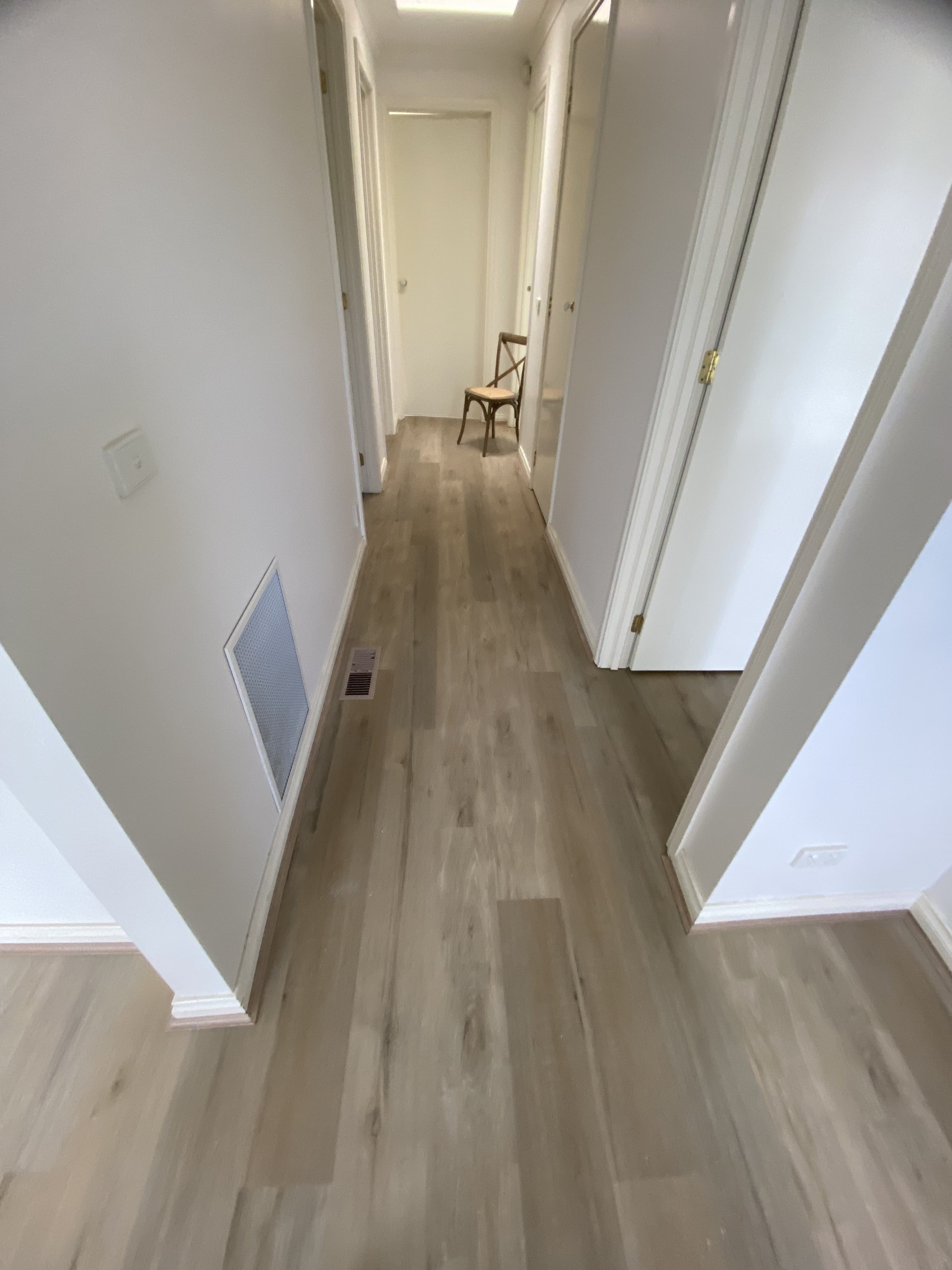Chevron pattern hybrid flooring commercial space