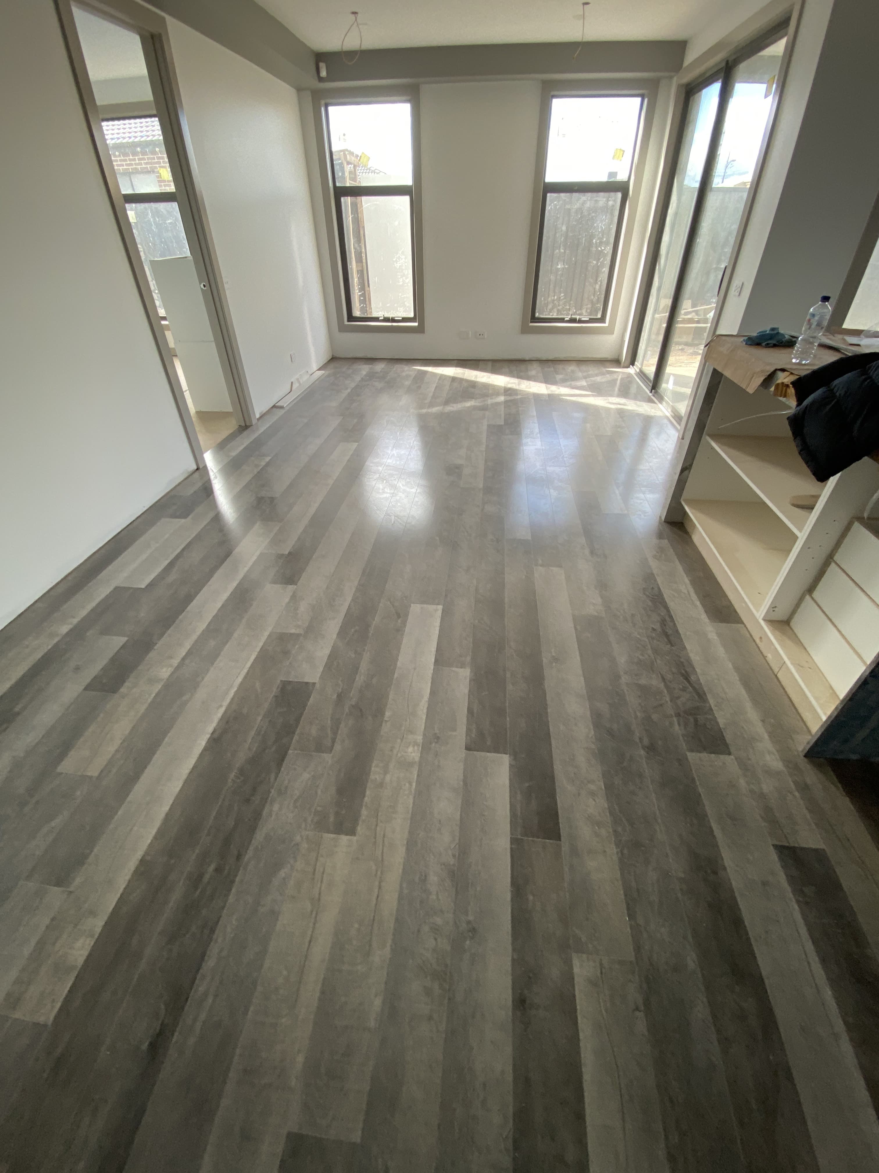 Grey herringbone hybrid flooring modern interior